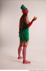 Veronika Elf Pose With Apple